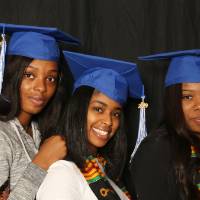 photobooth three friends smiling